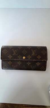 Louis Vuitton Porte Trésor International Long Wallet in Monogram Canvas
